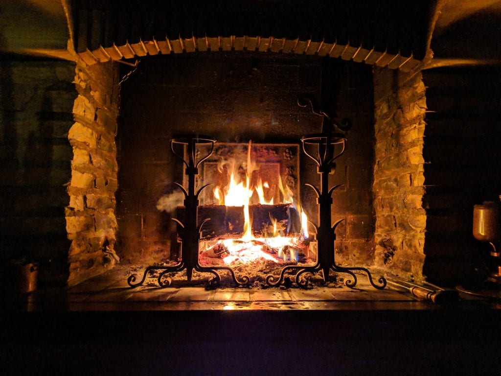 Burning fireplace with logs